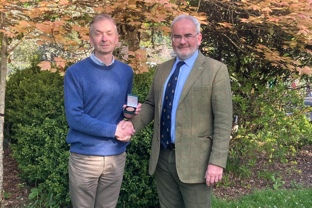 John Risby FICFor receives the Institute's Medal from President of the Institute of Chartered Foresters, Gerain Richards MVO FICFor